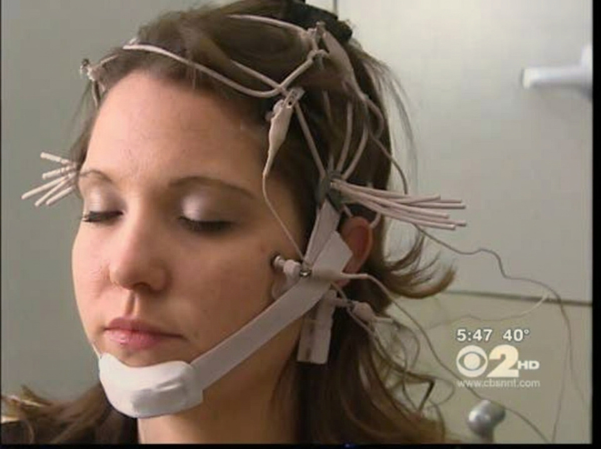Traditional EEG recording with multiple electrodes placed across the scalp